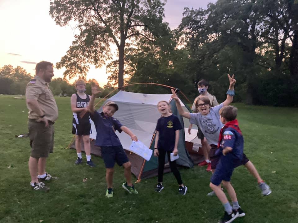 Cub Scouts playing outdoors